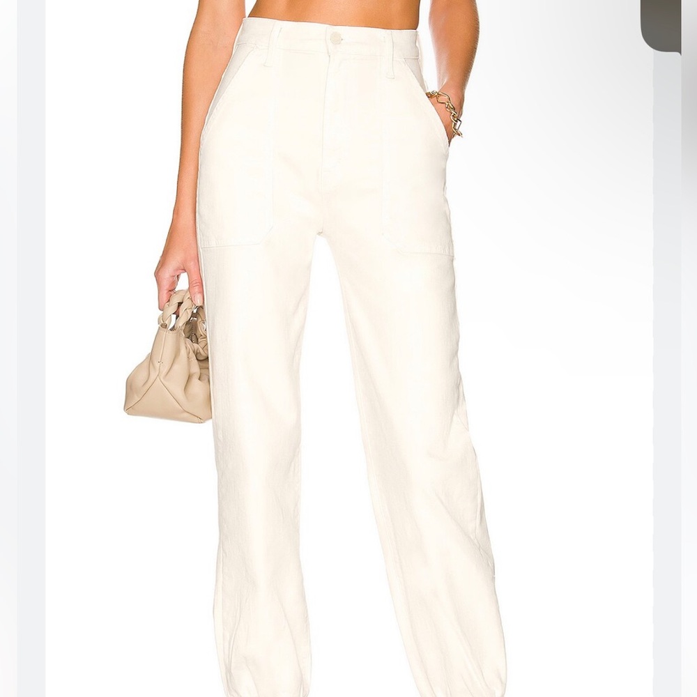 MOTHER WRAPPER PATCH SPRINGY ANKLE IN CREAMPUFF JEANS